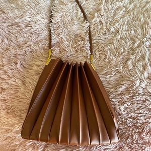 Brown pleated vegan bag by Anthropolgy